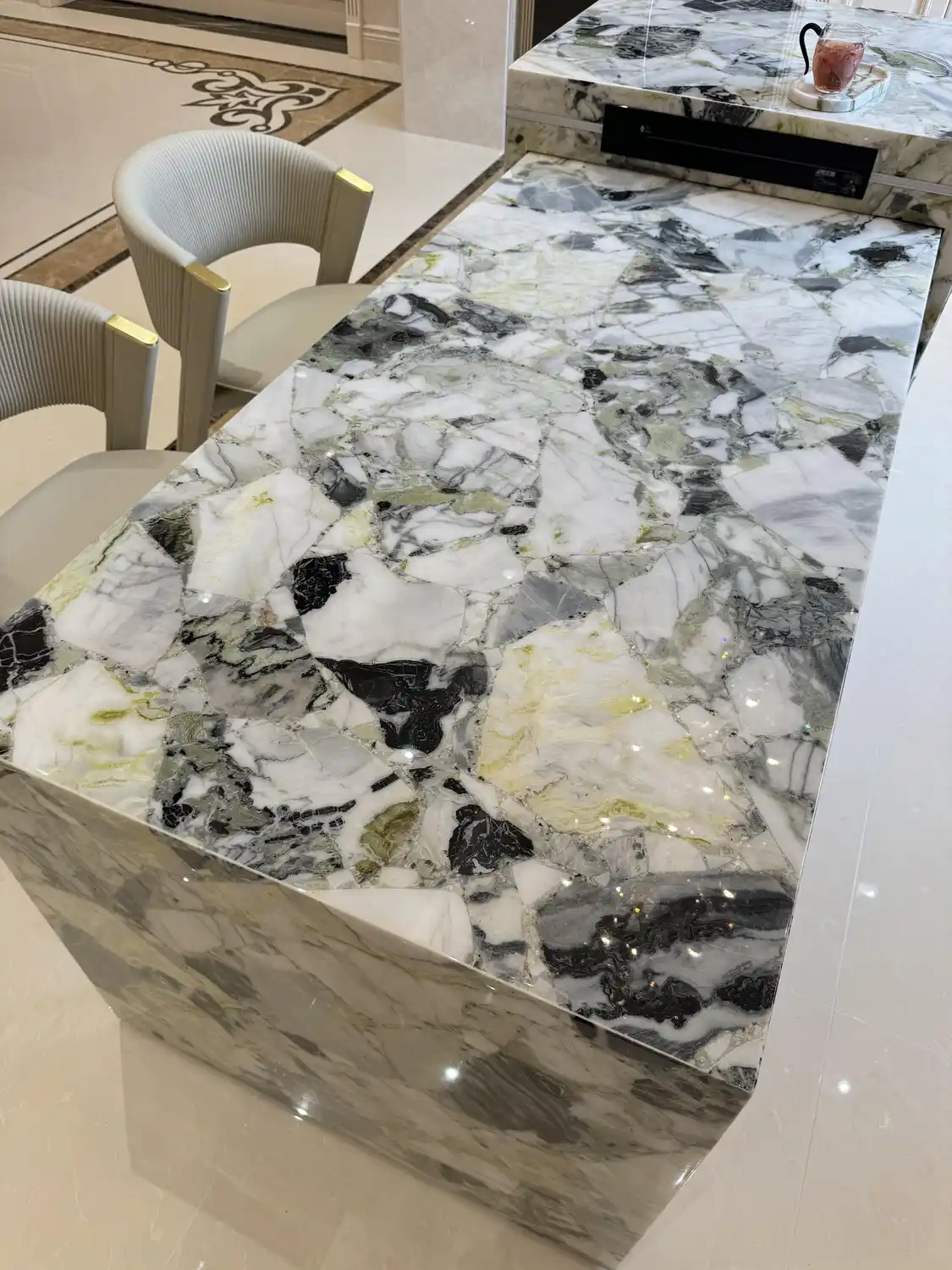 White, grey and black patterned stone counter with vertical side panels in China