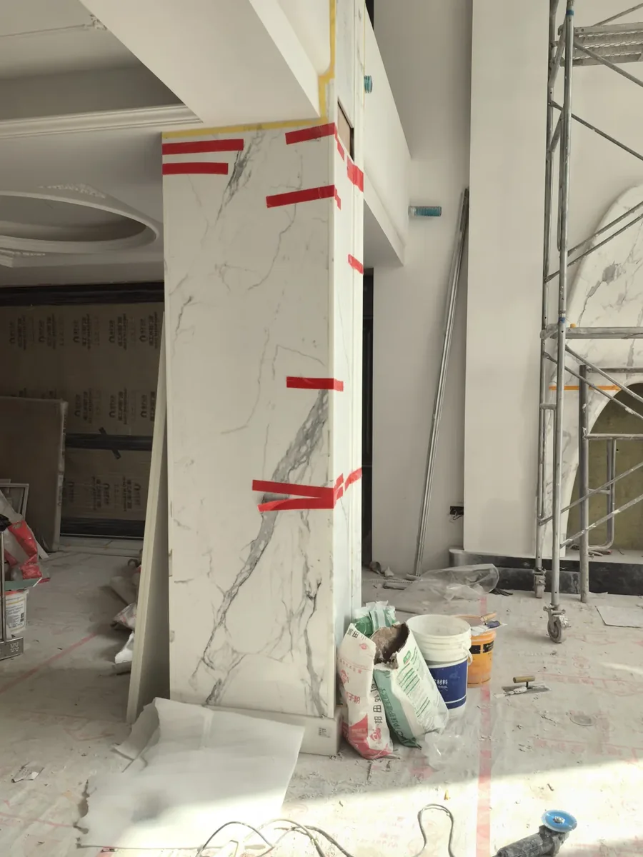 Dark gray marble accent wall in luxury interior