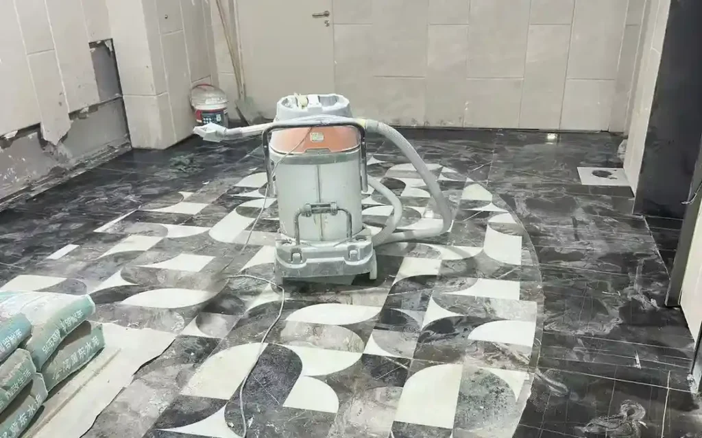 Stone floor finishing equipment on a patterned floor