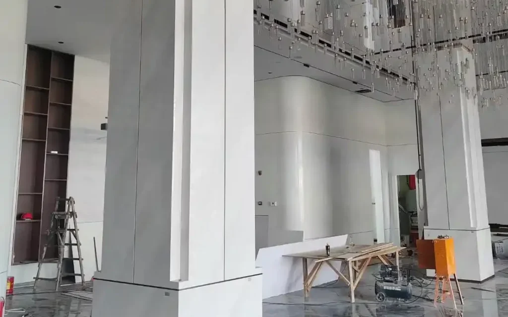 Interior stone-clad columns and flooring during site works